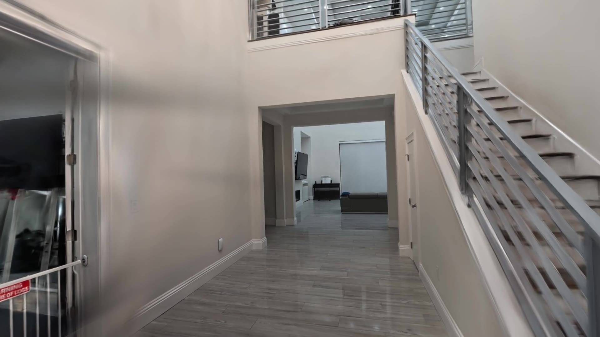Inside a real Rendition capture: the foyer and staircase of 5703 Tybee Island Drive